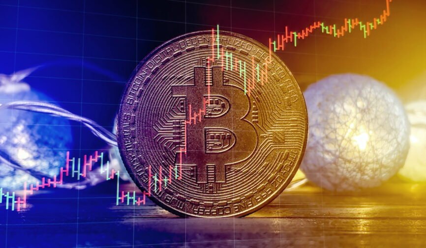 Bitcoin Stock Growth. Chart shows a strong increase in the price of bitcoin. Bitcoin gold coin and defocused chart background. Virtual cryptocurrency concept.